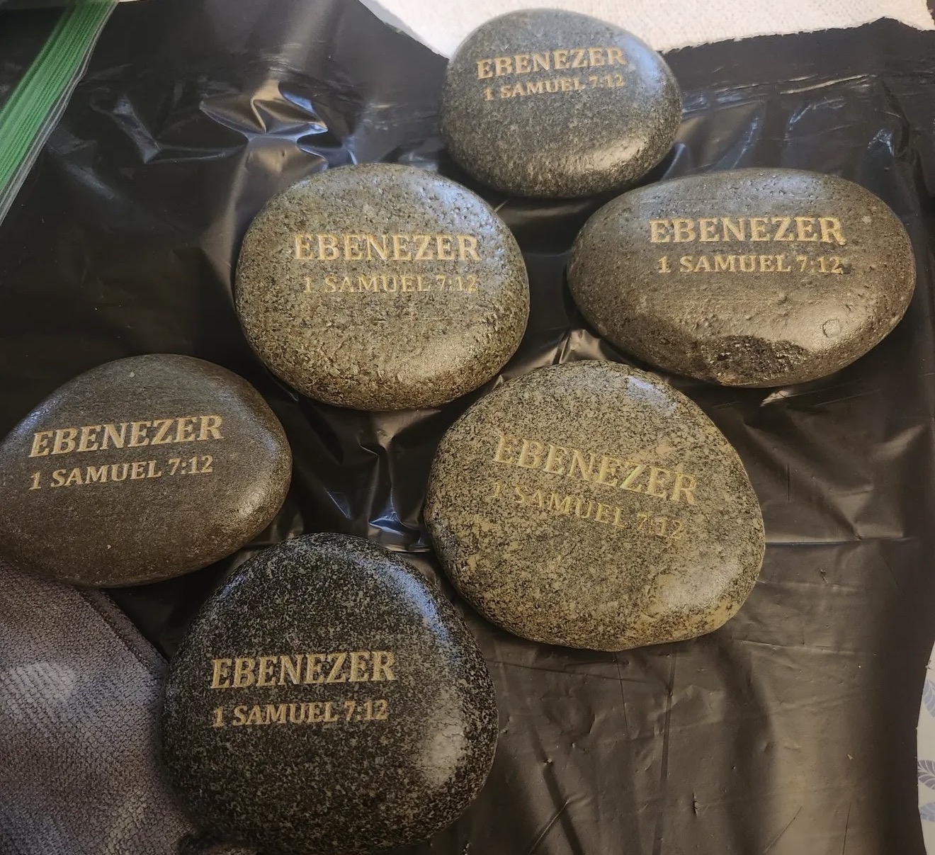 Engraved EBENEZER stones prepared for a ministry gathering